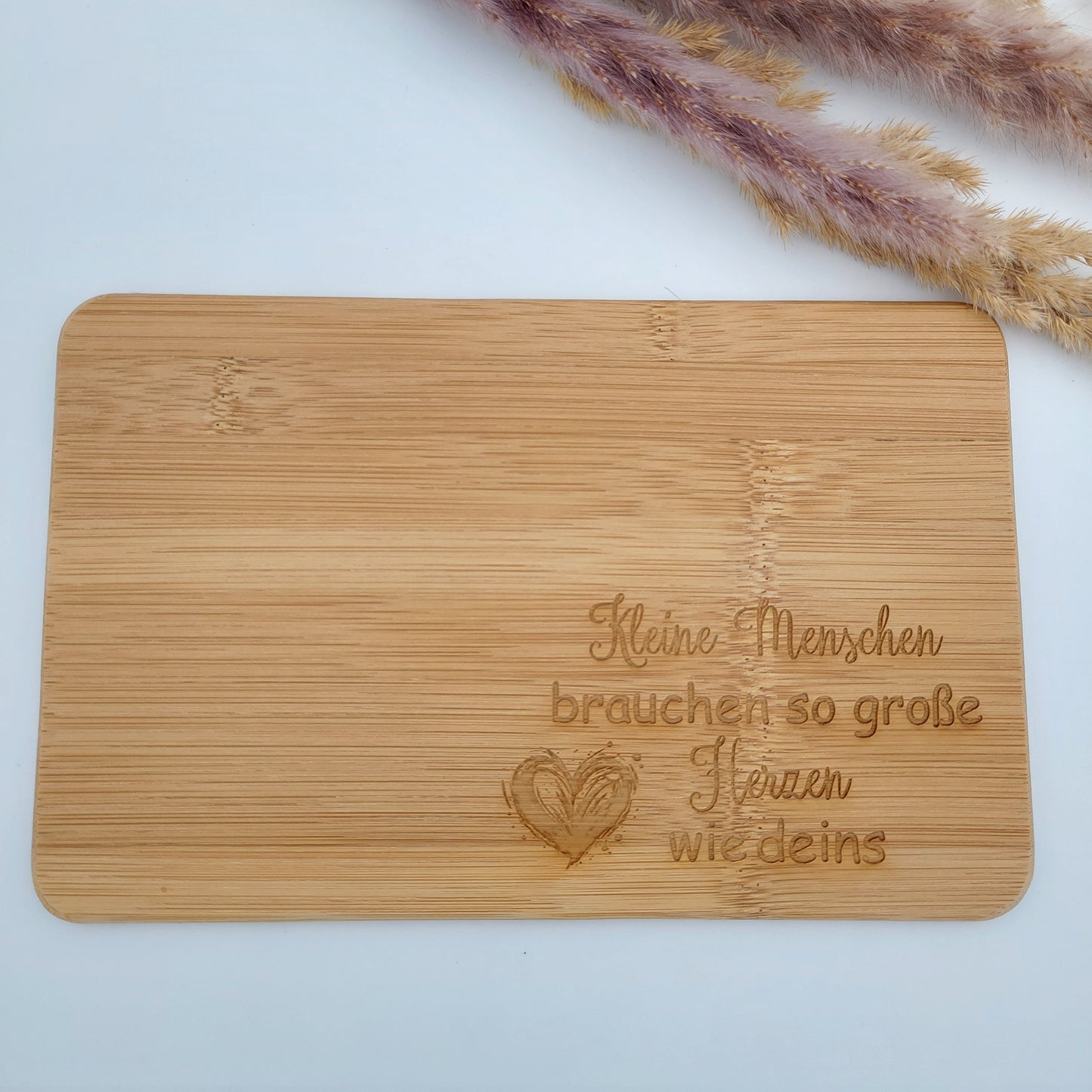 Frühstücksbrett Kleine Menschen brauchen....